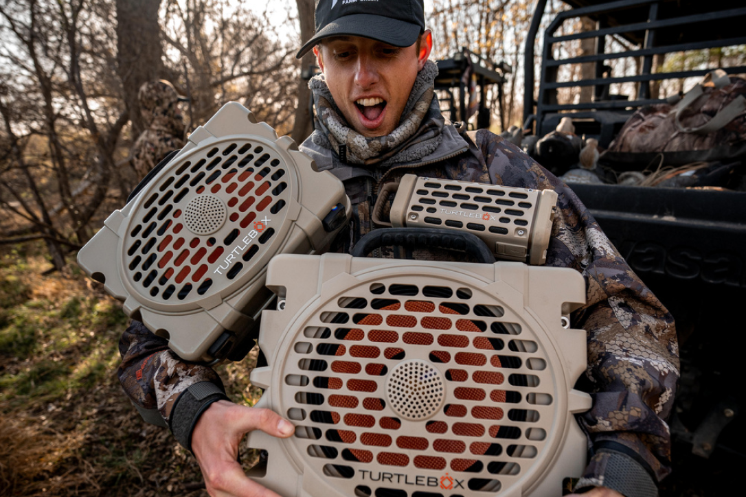 a happy BirdDog hunter after having the best speaker, a Turtlebox, playing music 